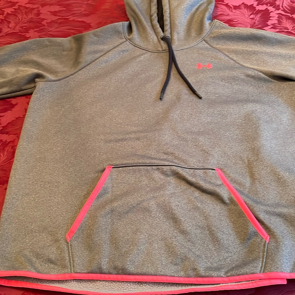 Womens Under armour hoodie size large. Gray with pink trim.